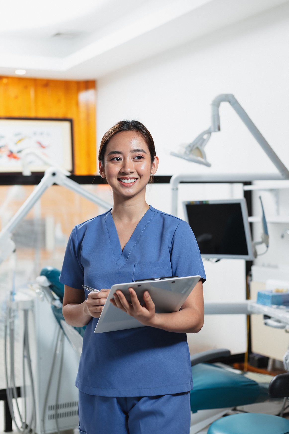 Dentist Holding Clipboard