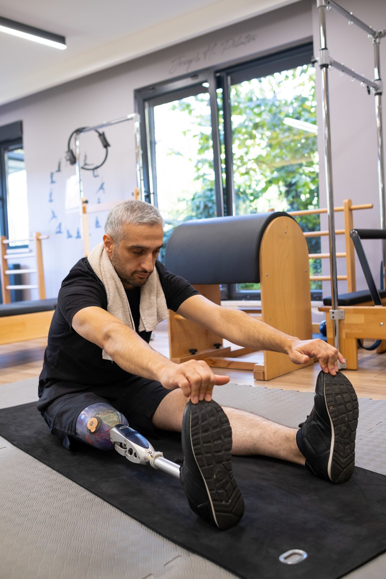 Amputee with Prosthetic Leg Undergoing Therapy